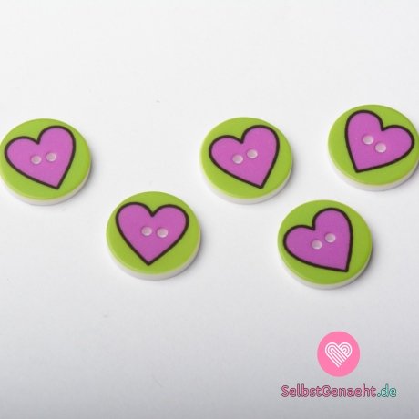 Runder, grüner Kinderknopf mit violettem Herz