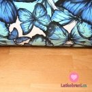 Teplákovina motýlci modří na smetanové