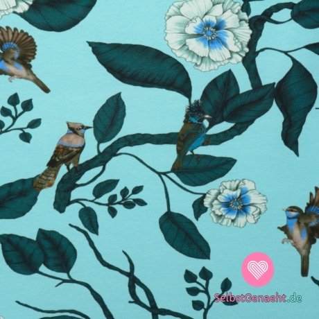 Strickmuster mit Blumen und Vögeln auf blauem Hintergrund