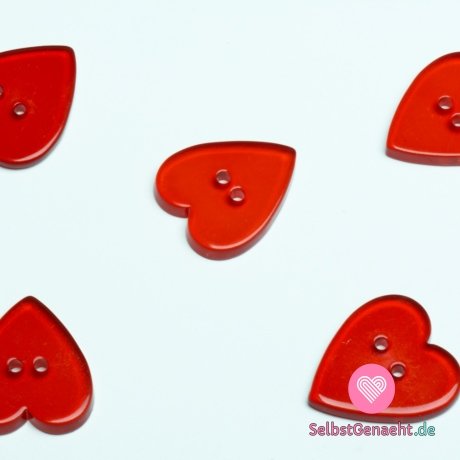 Glatter, transparenter roter Herzformknopf