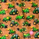 Úplet zelený traktor na poli s obilím