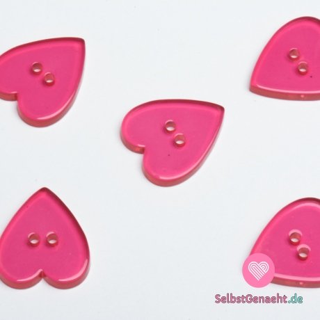 Glatter, transparenter rosafarbener Knopf in Herzform