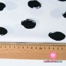 Bavlněný popelín točivé černé puntíky na bílé