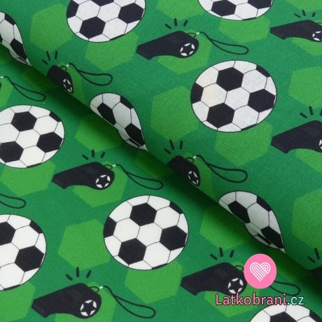 Bavlněné plátno fotbalové míče a píšťalky na zelené