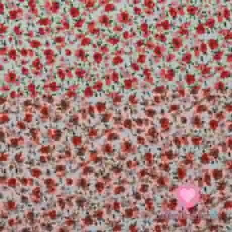 Viskózový úplet potlač drobné červené a ružové kvety na biele