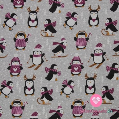 Pinguine mit Warmkeeper-Print in rosa Pullovern auf Grau
